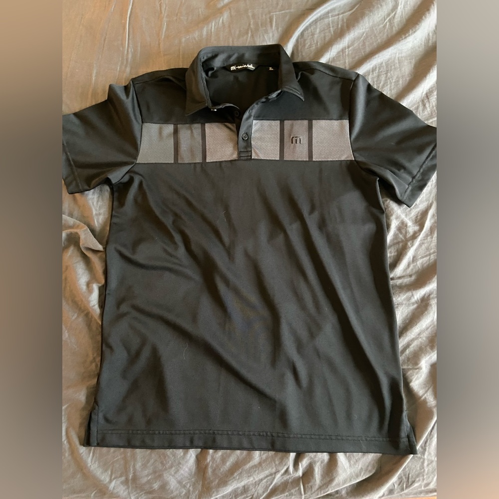 Men’s Travis Matthews golf polo.